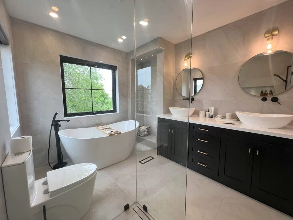 Minimal washroom with vanity, mirror, and tile